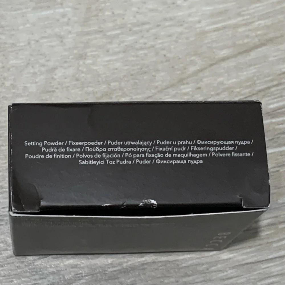 Becca hydra-mist setting and refreshing powder golden brown